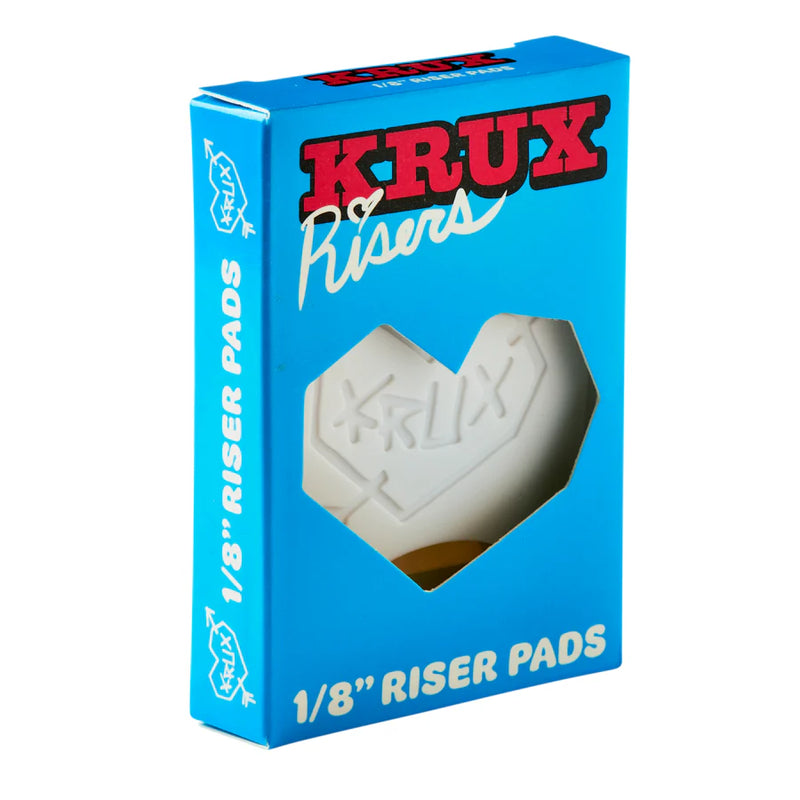 KRUX riser pads packaging with blue background and white riser pad illustration