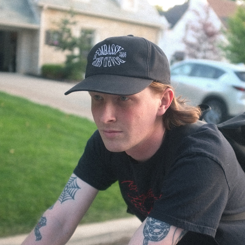 Embassy Mirror Logo Snap Back Hat