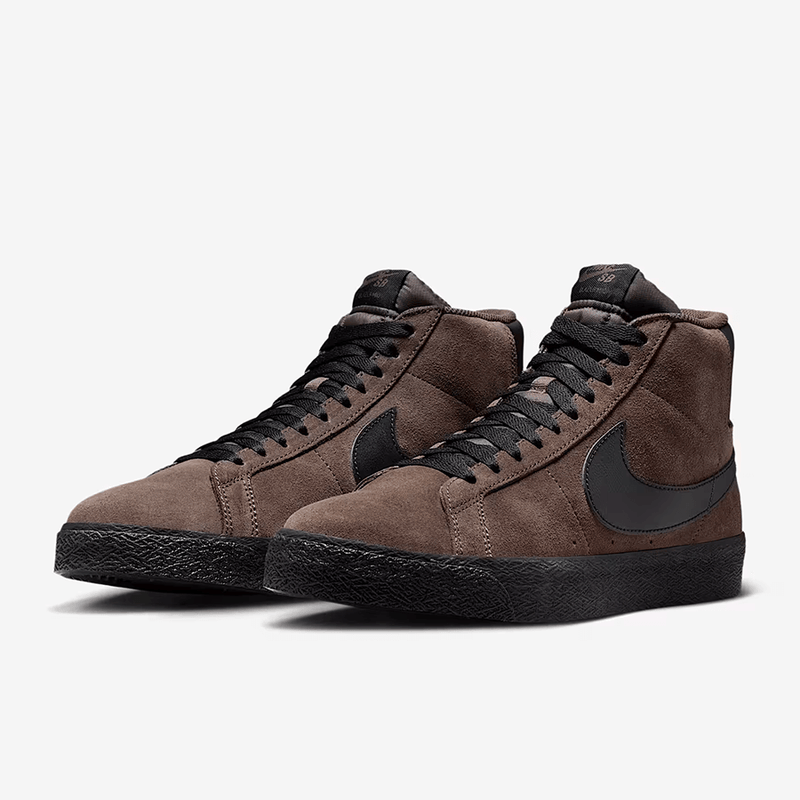 Brown high-top sneakers with black accents on a white background