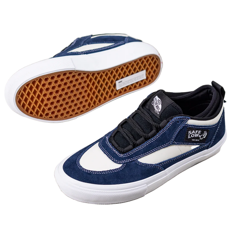 Blue and white sneakers with brown sole on a light gray background